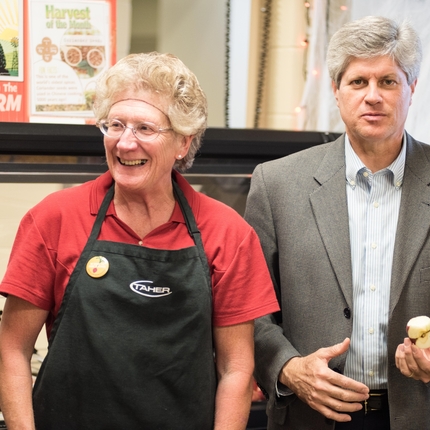 Cafeteria worker with congressman