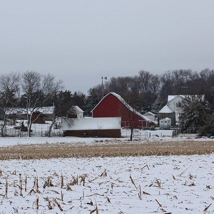 Small farm in a dusting of snow