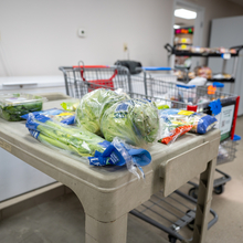 Produce sits on a cart.