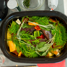 Buffalo roast with vegetables cooking in crock pot