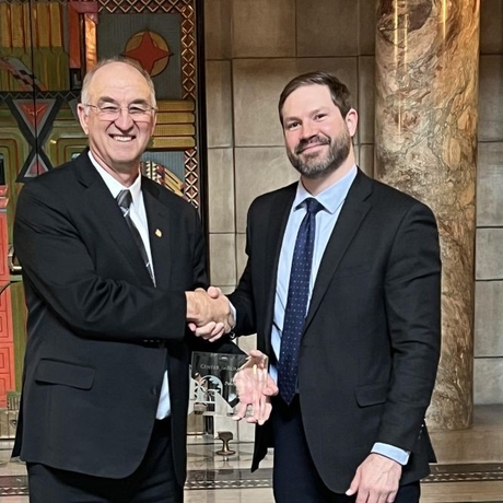 An image of two businessmen shaking hands