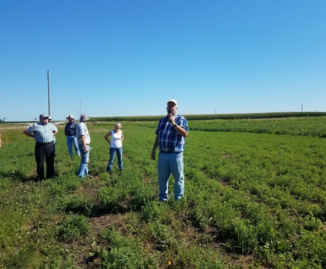 Man speaking at field day