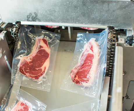 Cuts of meat being packaged