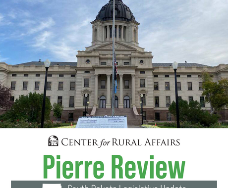 SD capitol building with Pierre Review header below it
