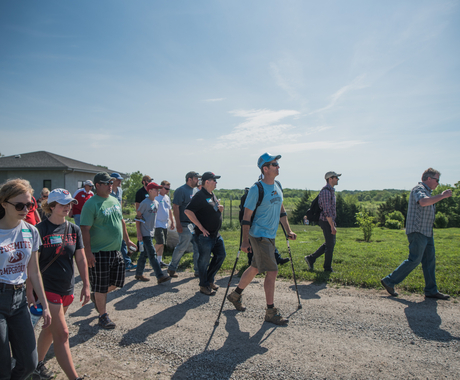 Man leading farm tour