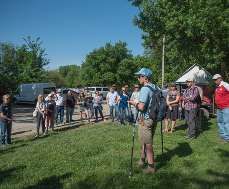 Man leading farm tour