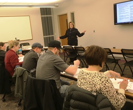 Woman teaching class