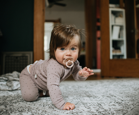 Baby crawling on the floor