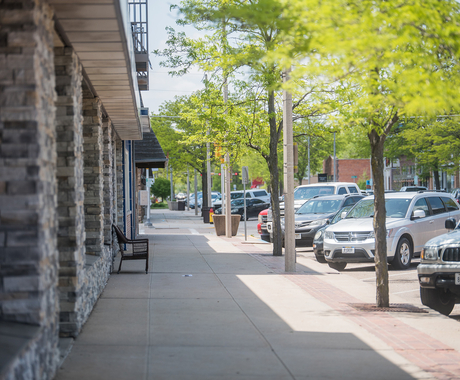 buildings and cars on main street 