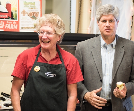 Cafeteria worker with congressman