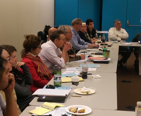 People at a table at a meeting