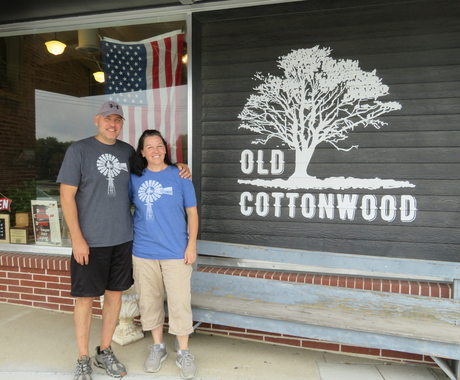 Business owners in front of store