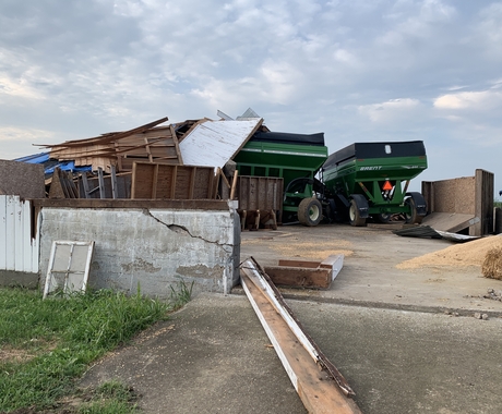 Combine in wind damaged shed