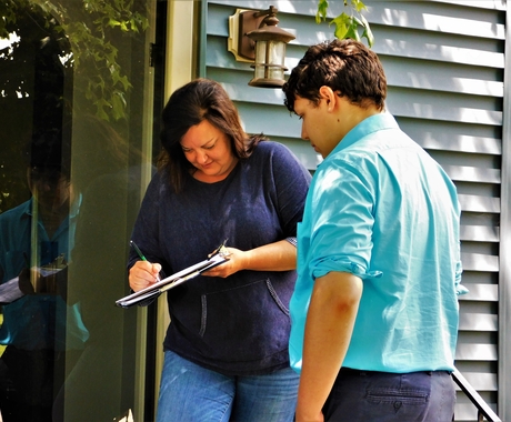 Center staff taking signatures