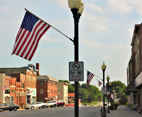 American flags on a downtown main street