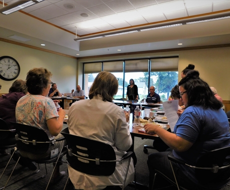 Community members meeting about Medicaid expansion 