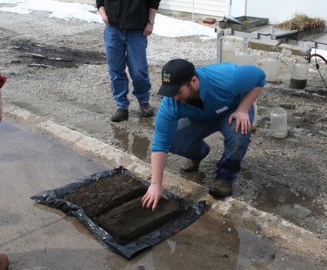 Man demonstrating soil health