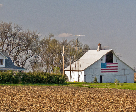 Barn with flag on it