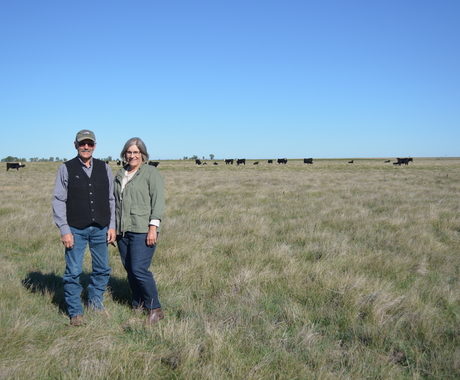 Mel and Jan Gimbel in a field. 