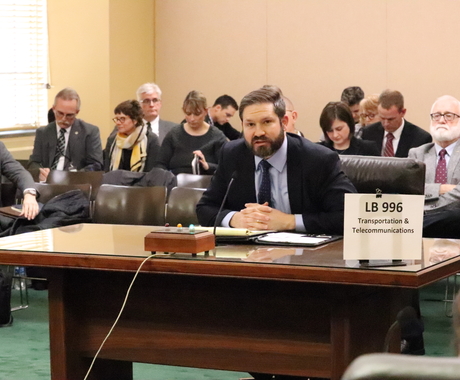 Man testifying at state legislative hearing