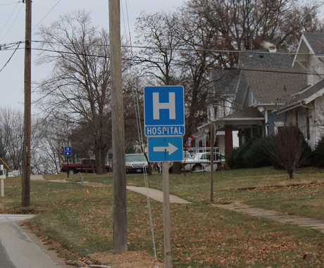Sign pointing to hospital