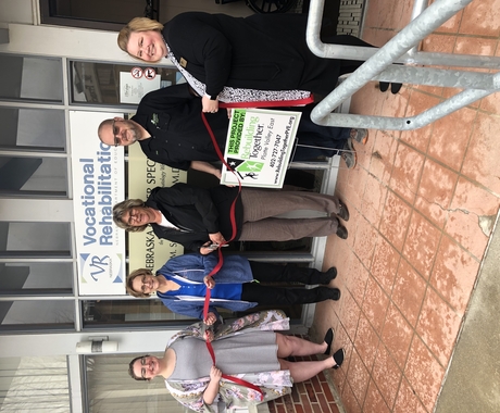 Ribbon cutting at business