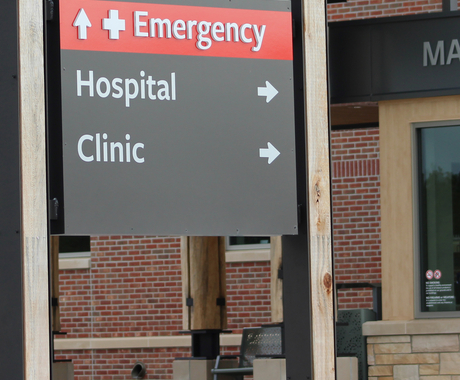 Rural hospital "emergency entrance" sign