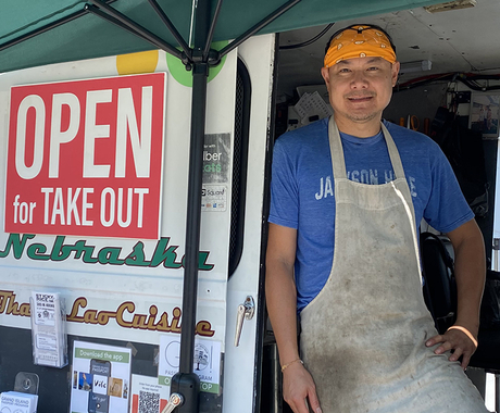 man posing in food truck