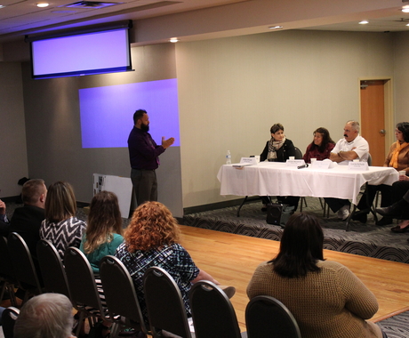 Panel in front of audience