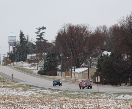 Highway coming out of Oakland, Nebraska, some snow on the ground