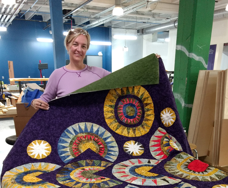 Woman with quilt