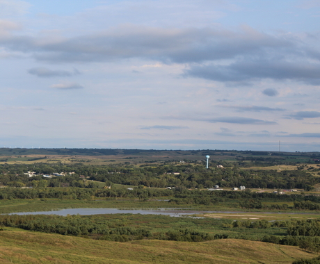 Rural community with ag and wind turbines