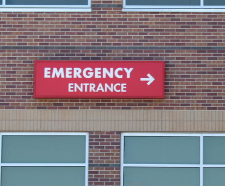 Rural hospital "emergency entrance" sign
