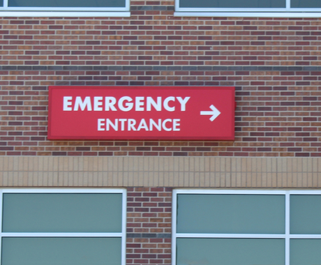 Rural hospital "emergency entrance" sign