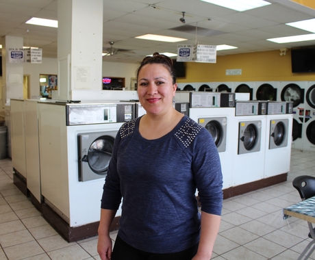 Woman at laundry business