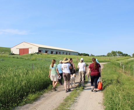 Women walking on farm path
