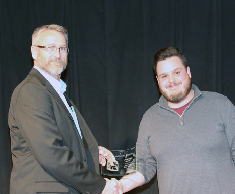 Ross Knott receiving his award from Lu Nelsen