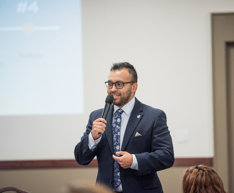 Man speaking at workshop