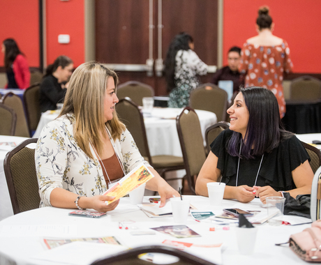 Two business women networking