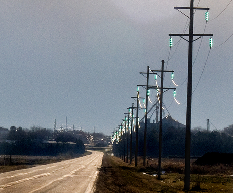 Power line with glass insulators