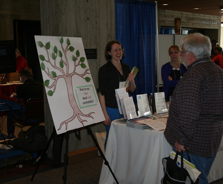 Women manning booth at conference