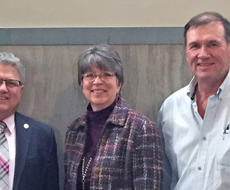 Two men and a woman at the Nebraska Legislature