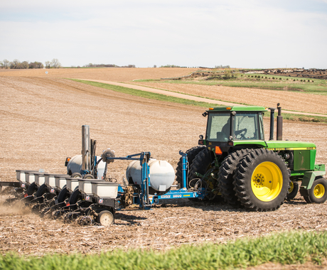 a tractor planting in a field