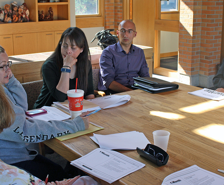 Community leaders talking around table