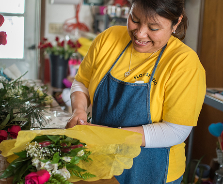 Woman business owner in flower shop