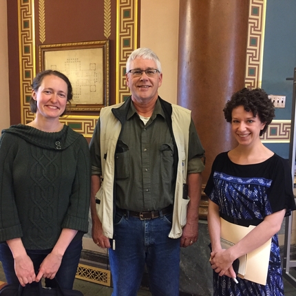 Two woman and a man at the Iowa statehouse