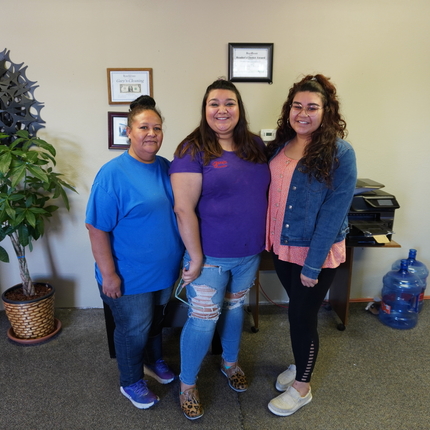 3 women smiling