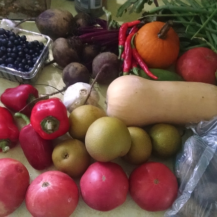 fruits and vegetables laid out on a table