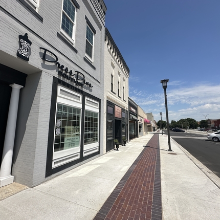 View of Main Street with buildings on the left and street on the right