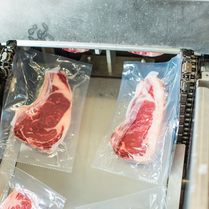 Cuts of meat being packaged